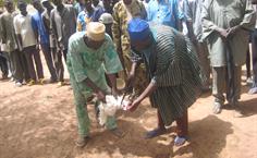 The village of Nano, Togo welcomes PHI volunteers with traditional custom